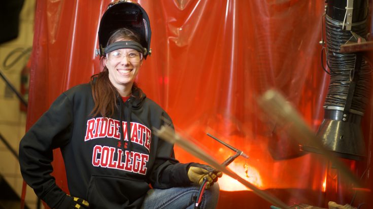 Welding female student