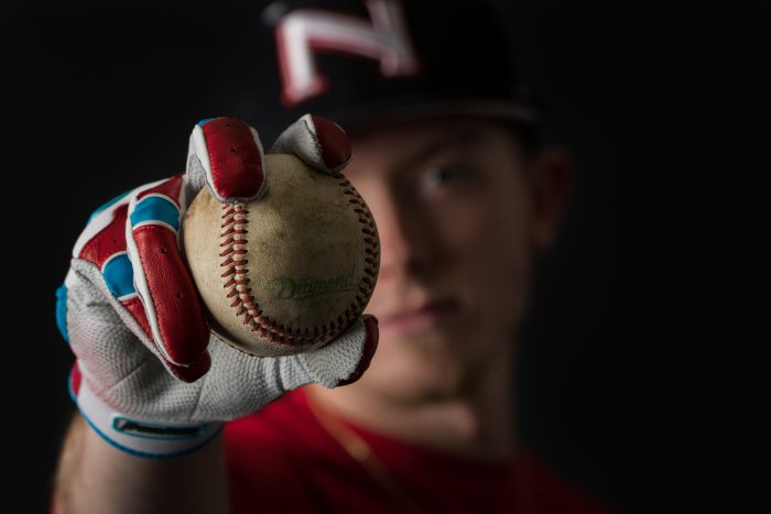 Picture taken by photography student - baseball player with ball