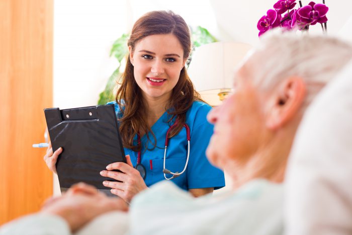 Nurse talking to patient