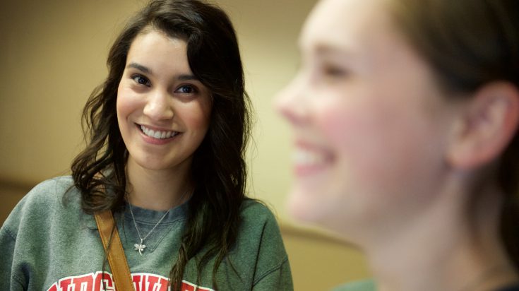 two girls smiling