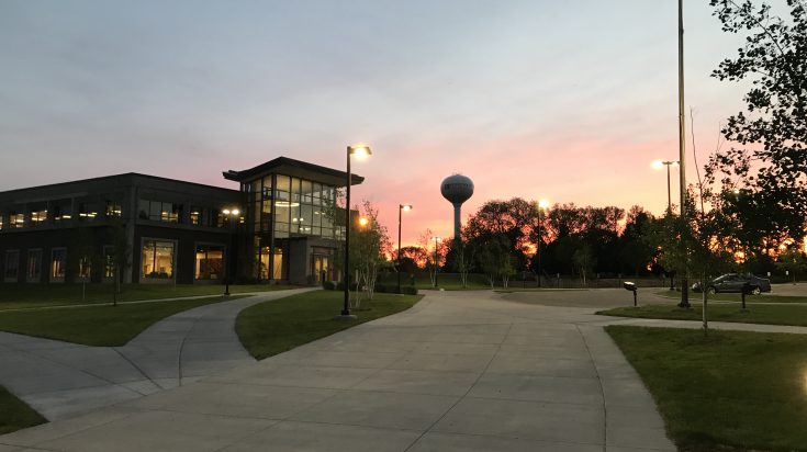 Willmar entrance sunset flagpole