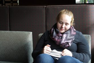 Female student sitting by herself studying