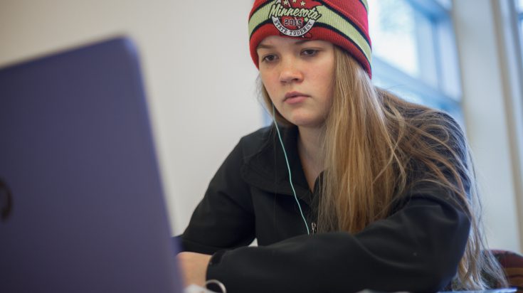 young female student at computer