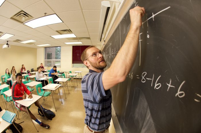 Instructor teaching a math class