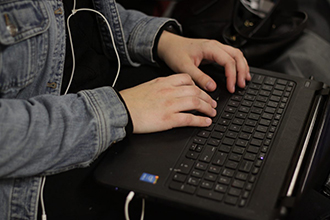 hands on computer keyboard