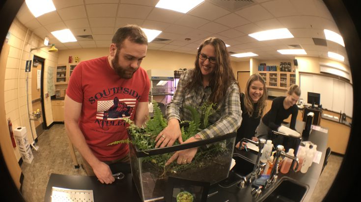 students and instructor in plant science class
