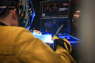 Photo of a person welding