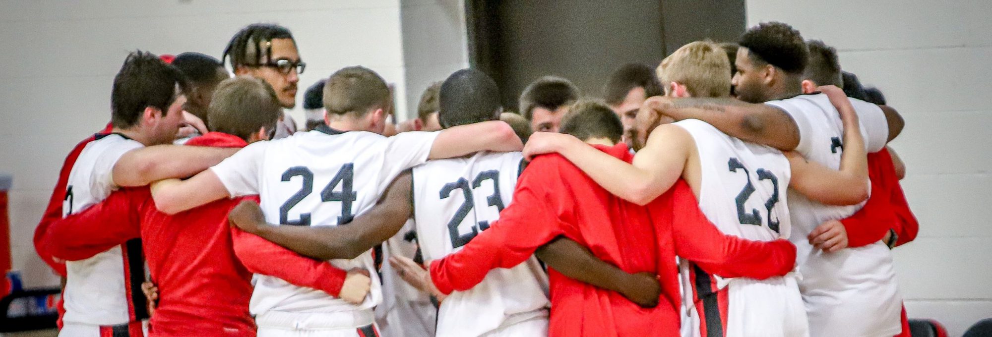Men's basketball huddle