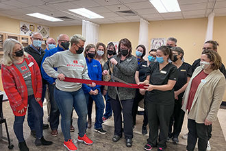 Hutchinson Chamber of Commerce Ambassadors help celebrate the excitement of Ridgewater College’s new Student Massage Center which opened to the public on the Hutchinson campus on Fri., January 21. Sharing the excitement are Ridgewater Allied Health Dean of Instruction Mary Leyk, Ambassador John Sommers, Ridgewater Technical Dean Matt Feuerborn, Ambassador Roman Bloemke, Ridgewater lab assistant Kiley Kruggel, Ambassadors Nicole Grobe, Angie Radke, and Calyn Liestman, Ridgewater Massage Therapy instructor Dr. Katy Lundell-Stuhr, Ambassador Joanna Jacobs, students Samantha Hovda and Shantelle Huls, Ambassador Mike Burnham, students Terresa Huselid and Chase Feltmann, and Hutchinson Chamber of Commerce President Mary Hodson.