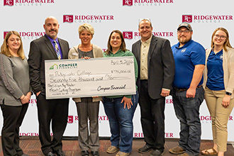 Pictured from left are: Compeer Financial’s Amy Kramer, Jeff Miller (Ridgewater dean of instruction), Kelly Magnuson (Ridgewater Foundation executive director and VP of advancement and outreach), Karen Johnson (Compeer Financial), Curt Yoose (Ridgewater Ag faculty), and Clayton Schreifels and Annalise Brede (Professional Agriculture Students (PAS))