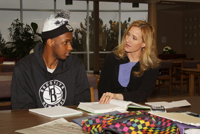 Photo of student receiving help from tutor