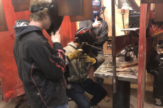 Welding students at work