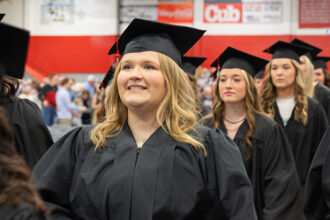 Ridgewater Agri Business graduate Cadence Larson of Benson takes one last walk with her classmates as she enters the Class of 2024 commencement ceremony in Willmar at the Civic Center.