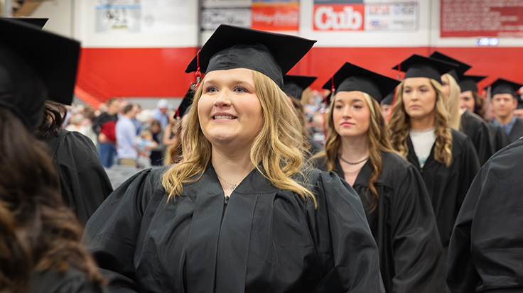 Ridgewater Agri Business graduate Cadence Larson of Benson takes one last walk with her classmates as she enters the Class of 2024 commencement ceremony in Willmar at the Civic Center.