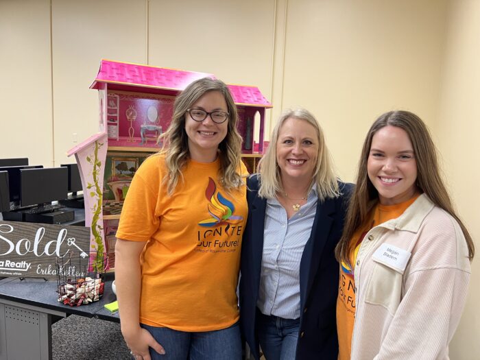 Photo of event volunteers and activity partner