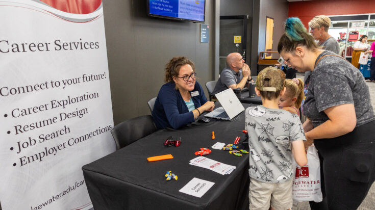 Photo of career services table at partner event
