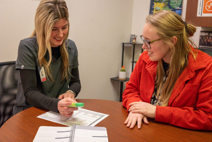 Photo of student working with academic coach
