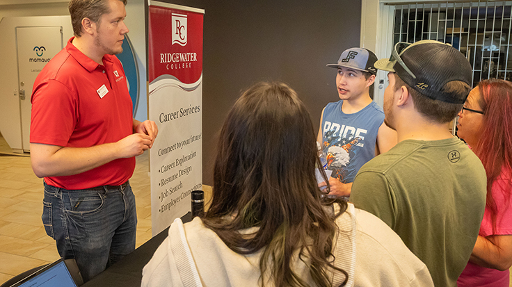 Photo of student with Career Services coordinator